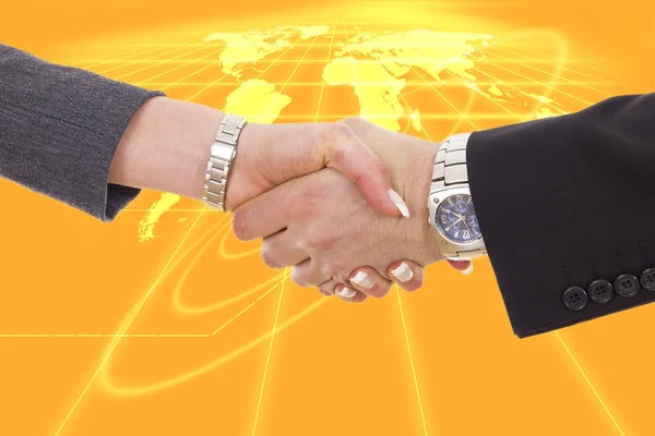Negocios estrechando las manos frente al mapa de la tierra —  Fotos de Stock