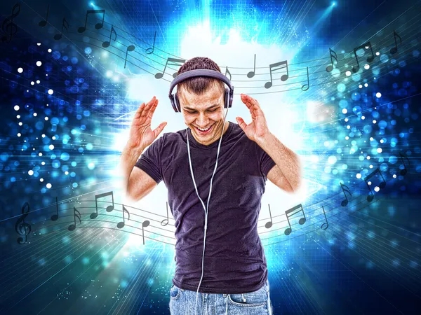 Man with headphones and notes all around him — Stock Photo, Image