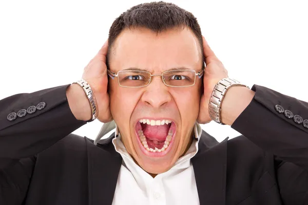 Homme stressé hurlant tenant sa tête — Photo