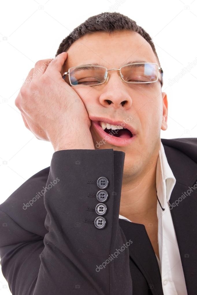 tired man with glasses yawning and sleeping