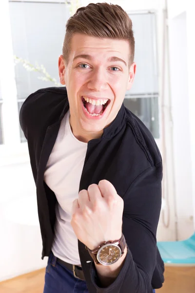Casual man showing with his hand sign of success — Stock Photo, Image