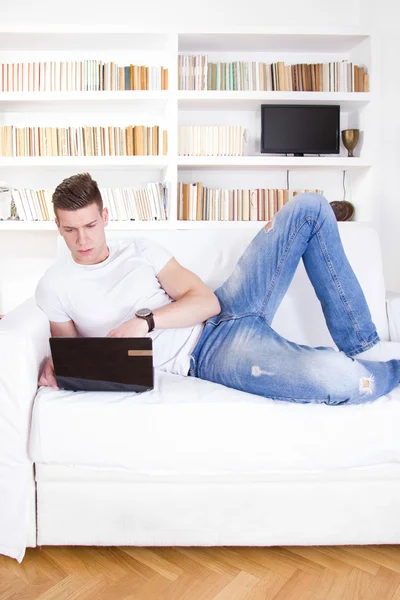Young man having love problems over laptop — Stock Photo, Image