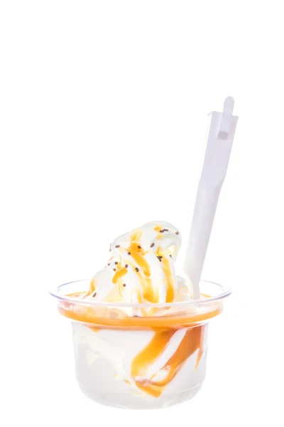 Soft vanilla ice cream with caramel topping and chocolate chips — Stock Photo, Image