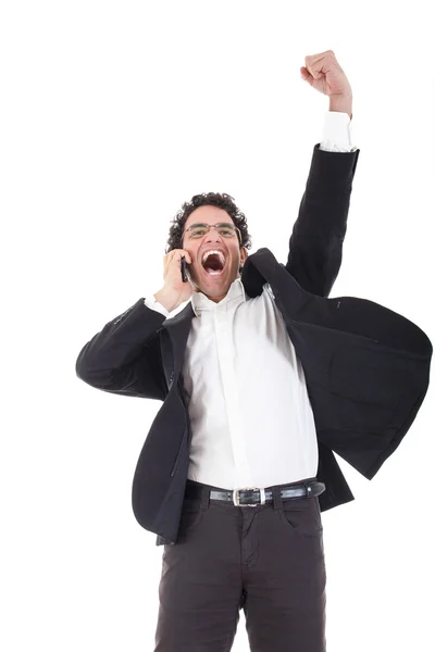 Mann im Anzug telefoniert mit Handy und zeigt Zeichen des Erfolgs — Stockfoto