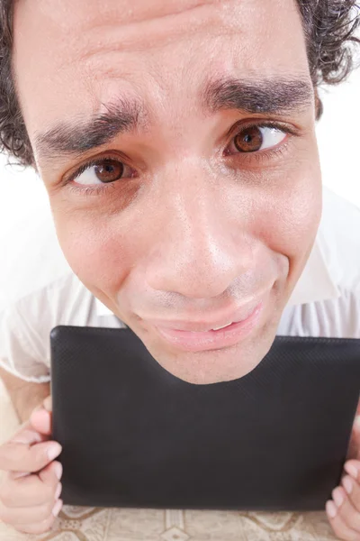 Cansado hombre de negocios de trabajo mientras en la desesperación sosteniendo y abrazando la —  Fotos de Stock