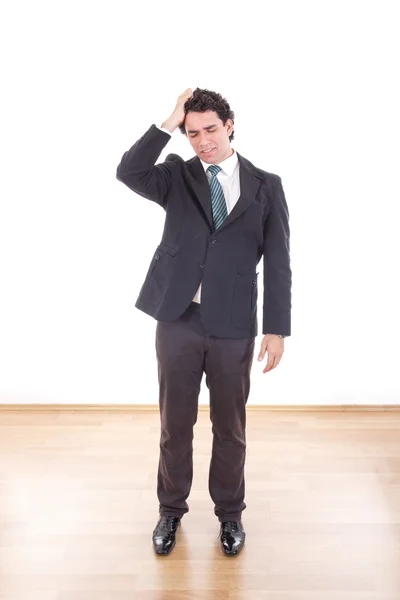Frustrado y deprimido hombre de negocios con dolor de cabeza celebración de su h — Foto de Stock