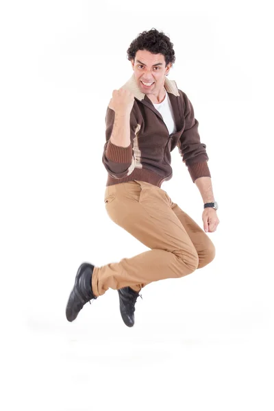 Excited man jumping out of joy achieving success — Stock Photo, Image