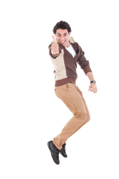 Ecstatic man showing thumbs up jumping of joy and excitement — Stock Photo, Image