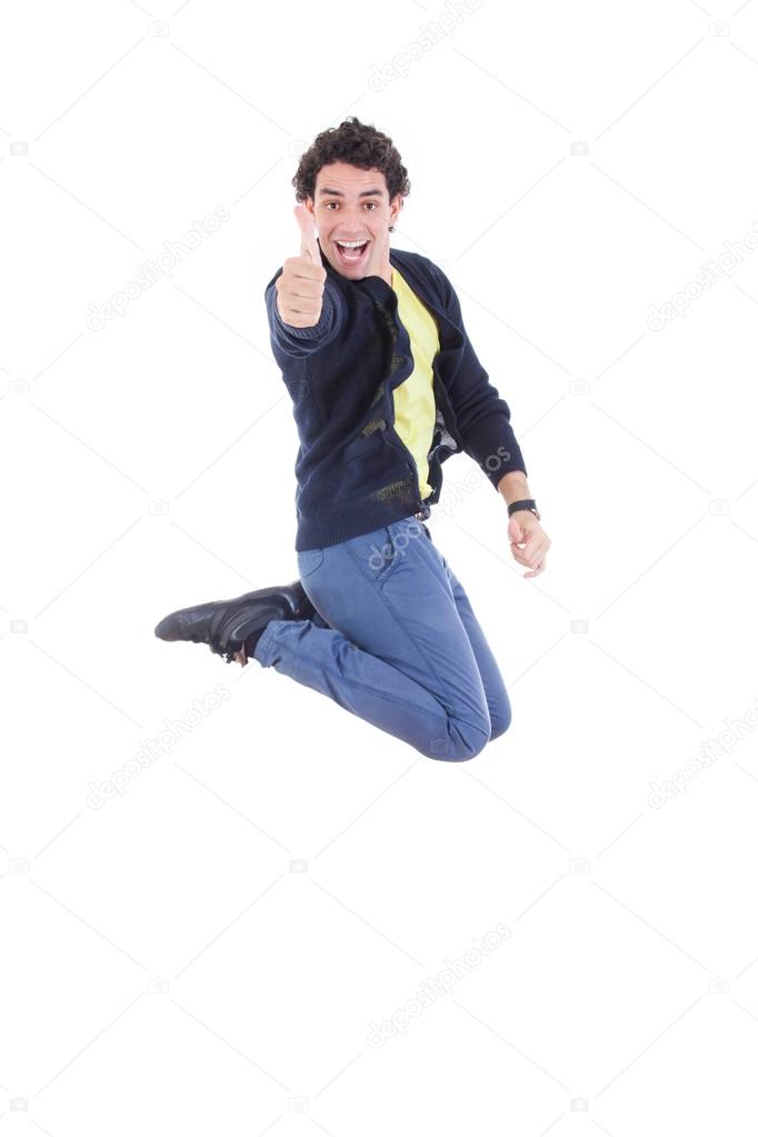 Portrait of young expressive caucasian man jumping of joy