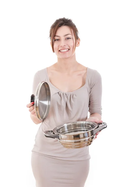 Lächelnde attraktive Frau öffnet Topf zum Kochen in der Küche — Stockfoto