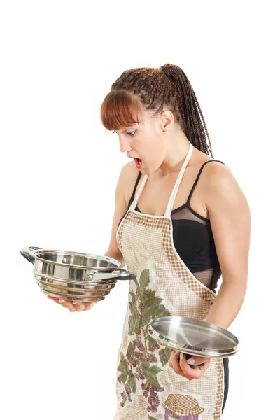 Woman standing in studio looking at empty cook pot — Stock Photo, Image