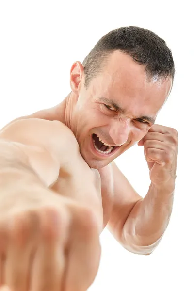 Крупным планом портрет боксера, бьющего ногами с выражением лица — стоковое фото