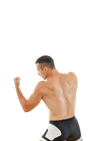 Young muscular sports guy with naked torso boxing — Stock Photo, Image