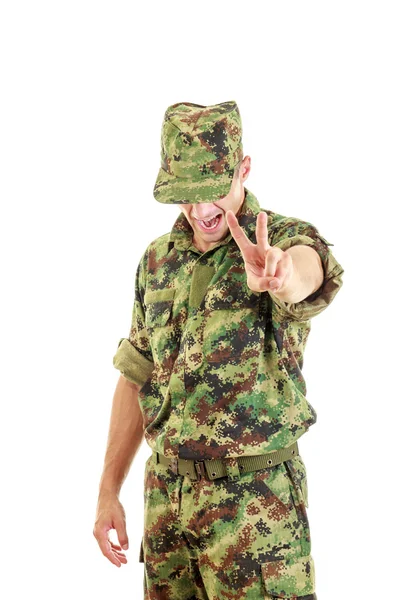 Angry soldier with hidden face in green camouflage uniform and h — Stock Photo, Image