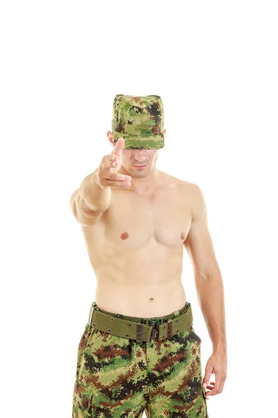 Military soldier in camouflage uniform pointing at camera — Stock Photo, Image