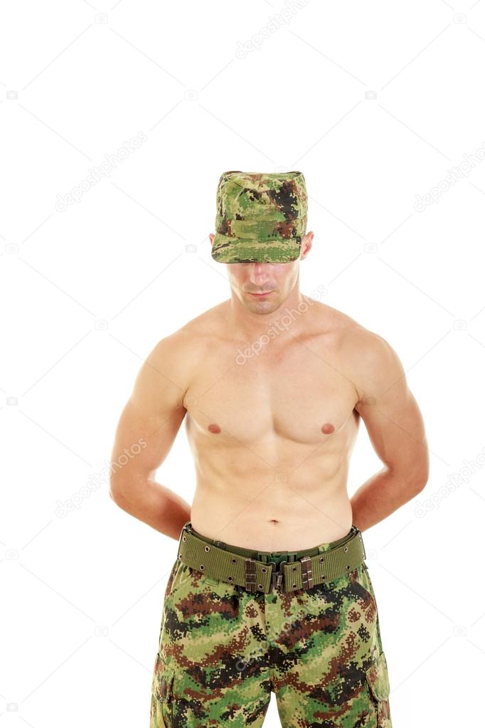 Soldier on security position wearing military pants and hat