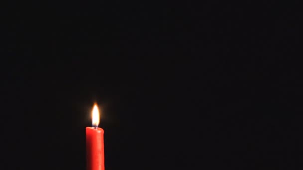 Burning candle with two hearts — Stock Video