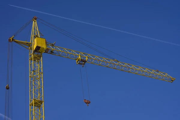 Top of tower crane against blue sky background — Stock Photo, Image