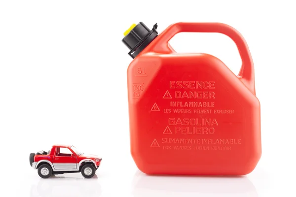 Toy car and essence container isolated — Stock Photo, Image