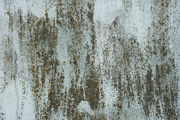Oude verf op roestige metalen oppervlak Stockafbeelding