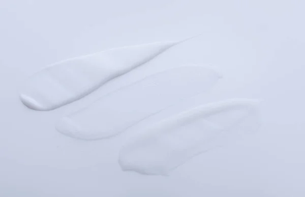 Зразки Крему Білому Тлі — стокове фото