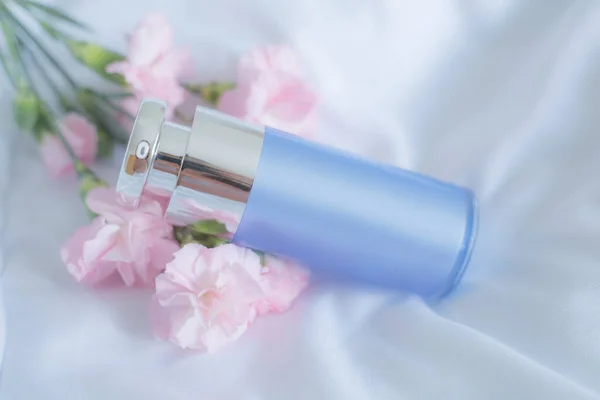 Blue cream tube with pink flowers