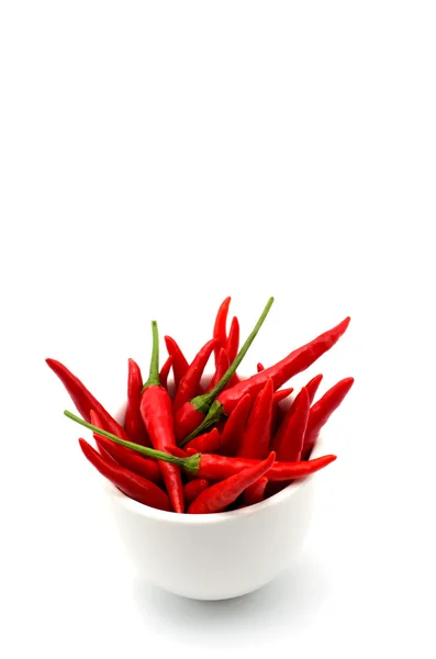 Chillies in a white bowl isolated on white background — Stock Photo, Image