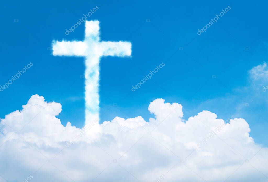Christian cross cloud shape on blue sky background