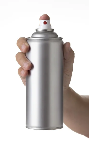 Man hand holding and spraying a blank aluminum spray paint can, an aerosol can. — Stock Photo, Image