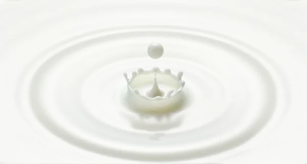 Milk drop drop created ripple and splash in crown shape — Stock Photo, Image