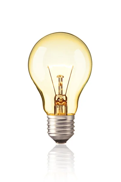 开启经典灯泡、钨灯泡、发光黄色灯泡是思维理念的标志和象征 — 图库照片