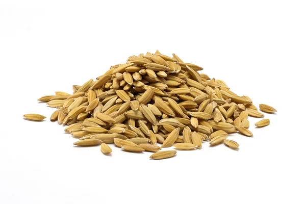 Une pile de grains de riz brut naturel Images De Stock Libres De Droits