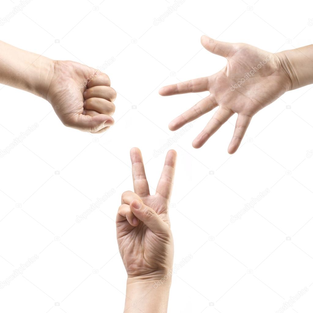 Closeup of hands making sign game, Rock, paper, scissors isolated on white