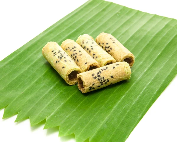 Thai coconut cracker roll on banana leaf. — Stock Photo, Image