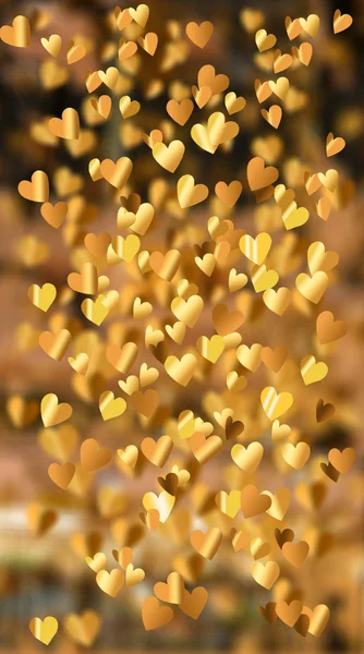 Achtergrond van gouden hart vliegen, collage. — Stockfoto
