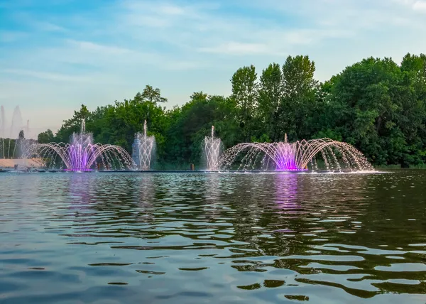 Singing fountains. Glowing colored fountains and laser show. — Stock Photo, Image
