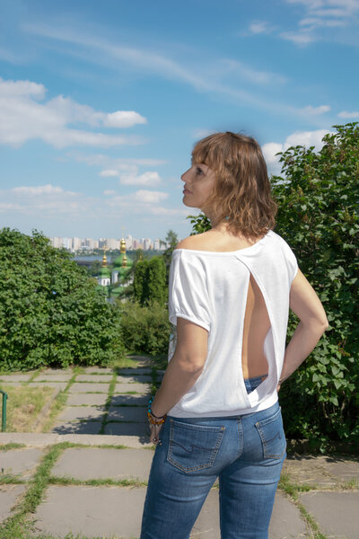 Young woman in summer park, bokeh
