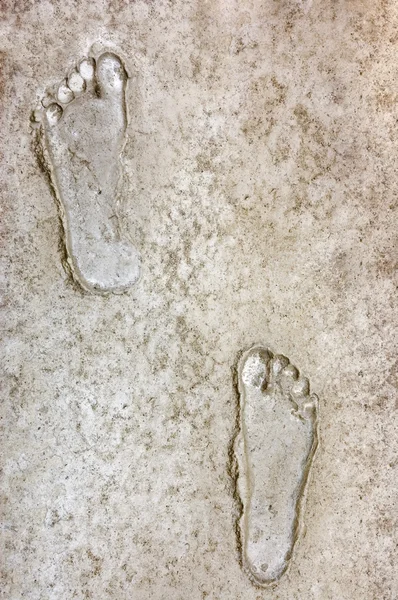 Lidské stopy v bahně — Stock fotografie