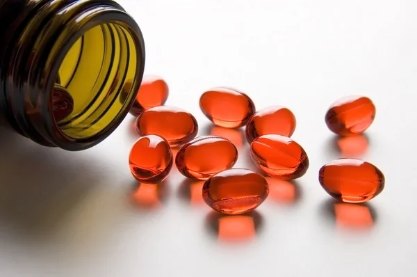 Rote Vitaminpillen — Stockfoto