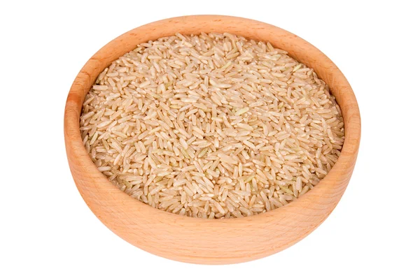 Rå brunt ris i trä skål — Stockfoto
