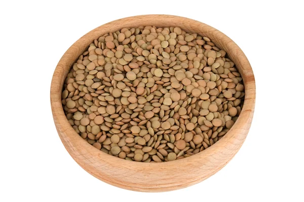 Lentils in wooden bowl — Stock Photo, Image