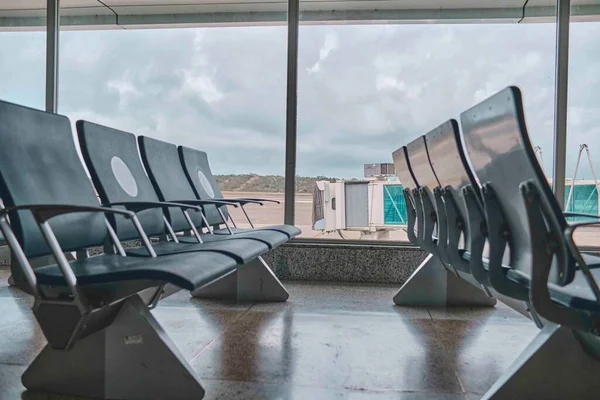 Empty Chairs Departure Hall Airport Blurred Plane Background — 스톡 사진