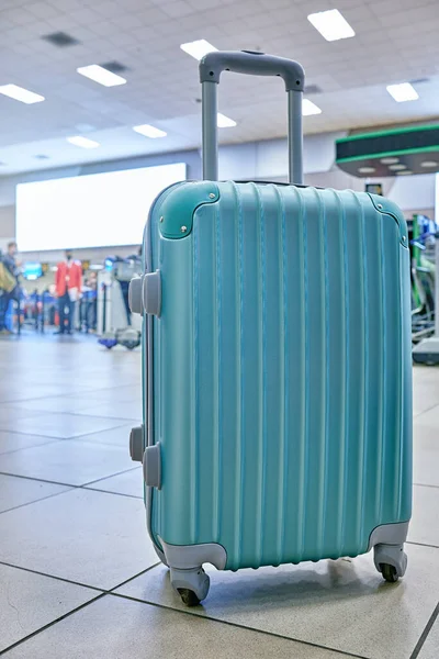 Suitcase or baggage with airport luggage trolley in the international airport.