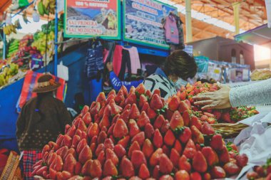 Arequipa, Peru - Aug, 2022: Fresh fruit and vegetable produce on sale in the central market, Mercado San Camilo