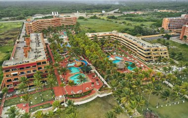 Top view of swimming pools on tropical beach in Caribbean hotel, drone view.