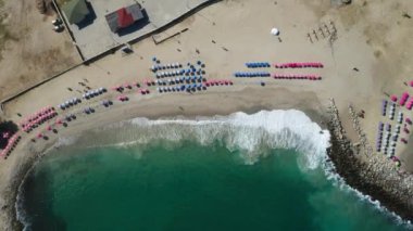 Aerial view picturesque public beach with turquoise water. Los Corales, La Guaira, Venezuela
