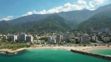 Aerial view picturesque public beach with turquoise water. Los Corales, La Guaira, Venezuela