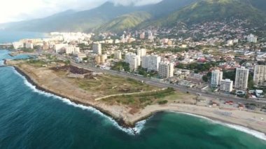 Aerial view picturesque public beach with turquoise water. Los Corales, La Guaira, Venezuela
