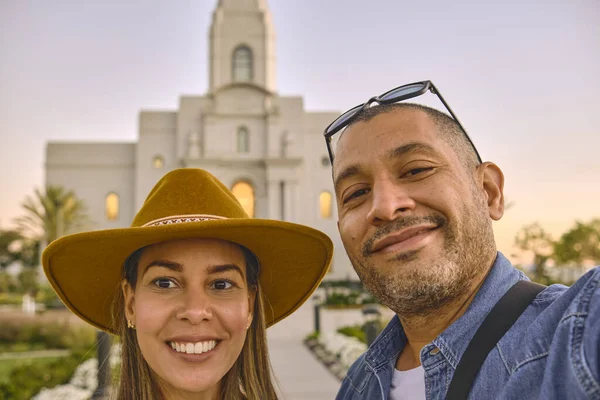 Couple Tourists Exploring the temple of The Church of Jesus Christ of Latter-day Saints, LDS Church, Arequipa. Peru.
