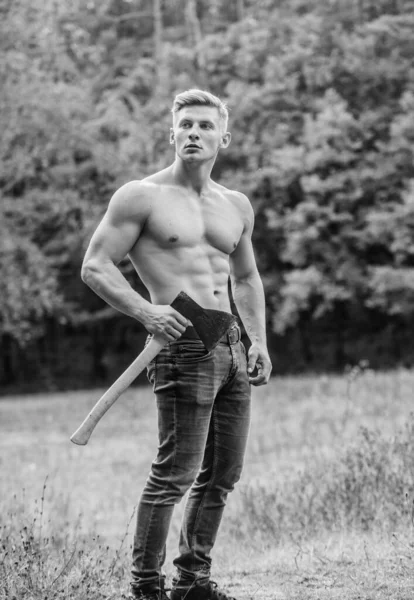 Handsome shirtless man muscular body. Muscular athlete in forest. Sport and fitness. Muscular body. Surviving in wild nature. Brutality is sexy. Strength and power concept. Sexy macho bare torso — Stock Photo, Image